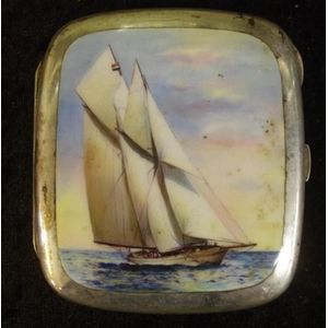 Silver and enamel cigarette case stamped 800, with a yacht…