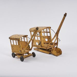 A pair of Triang crane toys, both in a weathered, used…