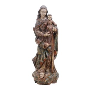 A European carved and polychrome-painted walnut group of the…