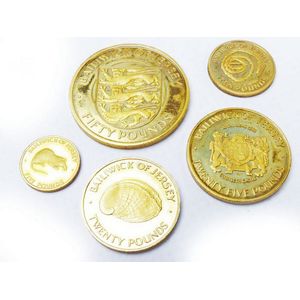Boxed gold and silver coins issued to commemorate the silver…
