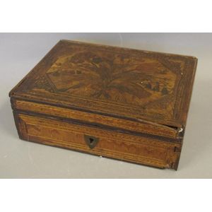 Antique straw sewing box, with a fitted interior, as inspected