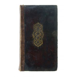 Leather bound Qu'ran. Provenance: A former diplomatic family…