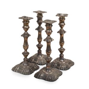 A set of four English sterling silver candle sticks, Sheffield…