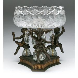 A cherubic based and cut crystal centrepiece bowl with hanging…