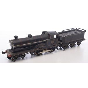 A Bing O gauge 0-4-0 Continental loco and tender black lined…