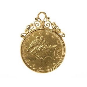 A Us 1901 Liberty head $10 dollar gold coin, in a decorative…