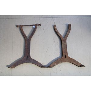Pair of cast campaign bench seat legs with broad arrow stamps