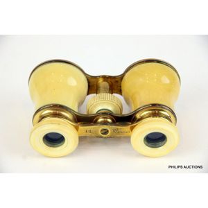 A pair of antique French ivory and brass opera glasses, circa…