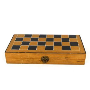 A vintage carved ivory chess set one half stained brown, the…