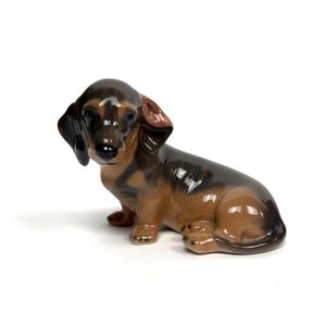 A Royal Copenhagen porcelain figure of a Dachshund, height 8 cm