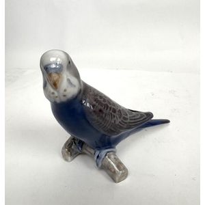 A Royal Copenhagen, Denmark porcelain figure of a budgerigar,&hellip;