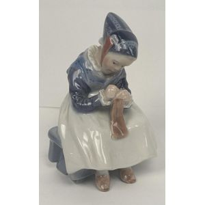 A Royal Copenhagen, Denmark porcelain figure of a Amager girl&hellip;