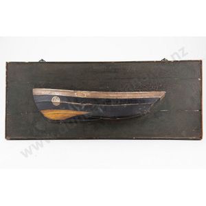 Half hull model of a coble painted in black white and gold on a…
