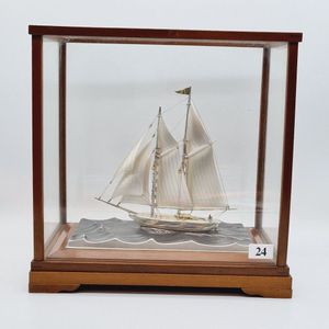 Sterling silver ship, cased Japanese silver model of a ship by…