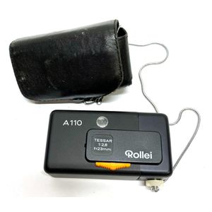 A Rollei A110 film camera, Tessar F 23 mm 2.8 lens, with case
