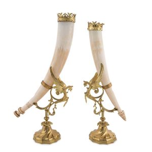 A pair of unusual tribal horns, carved ivory with French ormolu…