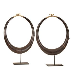 A pair of Kalabubu coconut necklaces, tapering shape, slices of…