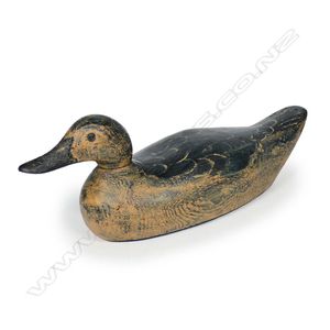 A c.1940 carved and painted solid wood duck decoy, 16 1/2 inch,…