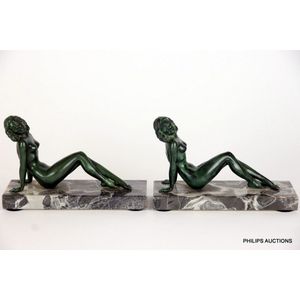 A pair of female nude spelter book ends, 20th century, in…