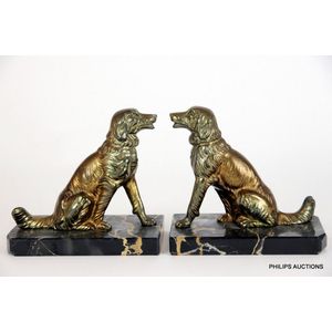 A pair of spelter dog bookends, circa 1930, seated retrievers…