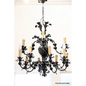 A fine antique wrought iron twelve light chandelier, 19th…