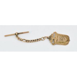 A medal fob, monogrammed AD on front and presented to…