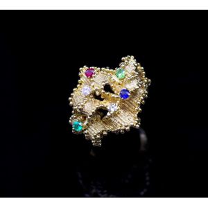 Multi gemstone yellow gold ring marked 18k. Set with white and…