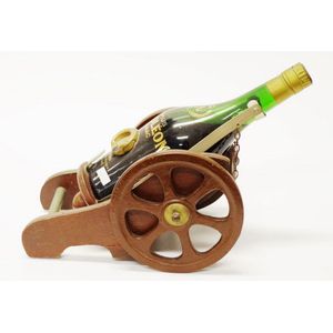 One bottle of Camus Napoleon cognac mounted on a wood canon…