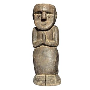 A wooden figure of a praying person, Kalimantan, Indonesia,&hellip;