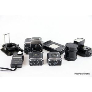 A collection of vintage photographic equipment, Hasselblad etc,…