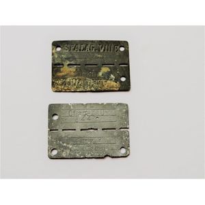 Two 1939-1945 World War II Prisoner of war zinc Identity tags.&hellip;