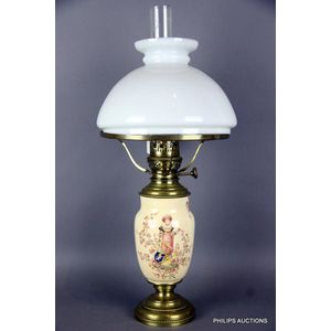 A French fuel lamp, 19th century, the lamp with a porcelain…