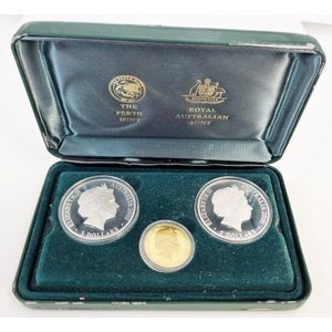 A cased set of Australian proof coins 2000, two $5 silver and a…