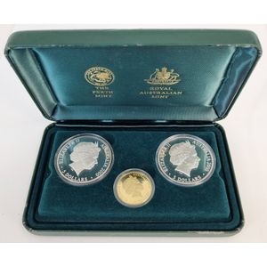 A cased set of Australian proof coins 2000, two $5 silver and a…
