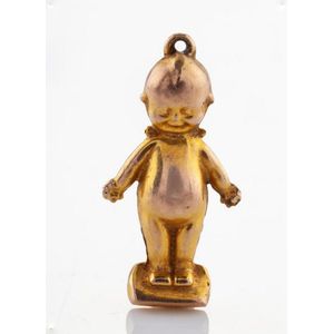 A gold Kewpie doll charm. 9ct rose gold. Weight 0.73 grams.…
