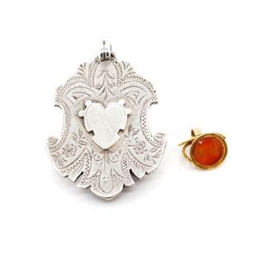 A heavy Edwardian silver fob medal and another carnelian and…