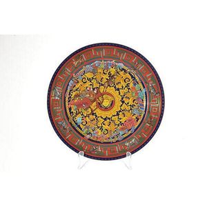 A porcelain plate by Versace, manufactured by Rosenthal, the…