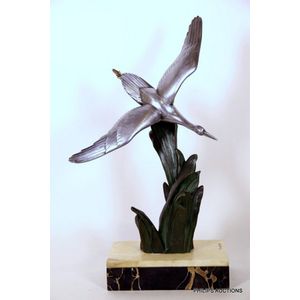 An Art Deco bronze bird figure by Irinee Rochard (1906-1984),…