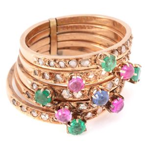 A five gold band gemset ring, 3 mm wide bands set with faceted…