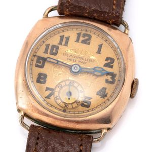 A lady's vintage gold filled wristwatch, cushion form case with…