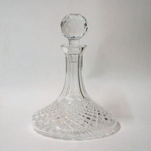 A Waterford cut crystal ship's decanter, the wide base tapering…