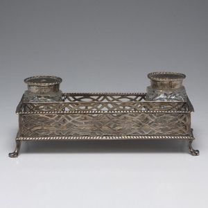 George II sterling silver pierced desk set with lion paw feet…