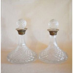 A pair of miniature ship's decanters, sterling silver mounted…