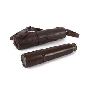 A brass and leather bound telescope in original leather case,…