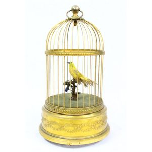 An antique French bird music cage together with a vintage glass…