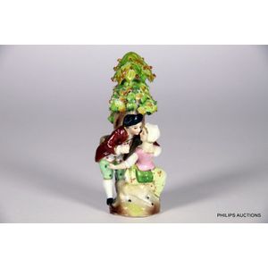 A Sitzendorf porcelain figural perfume bottle, 19th century,…