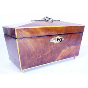 Regency flame mahogany tea caddy with boxwood stringing, the…