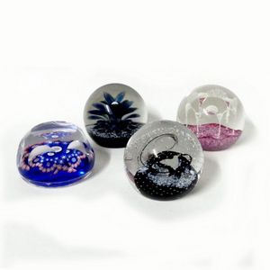 Three Caithness and one Whitefriars paperweights, the…