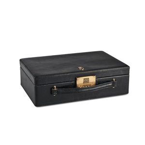 A black leather travel jewellery box and a crocodile leather…
