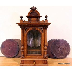 A fine walnut upright disk 'Polyphon' with fifteen Disks, circa…